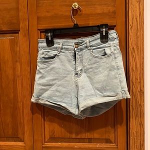 Light wash denim shorts.